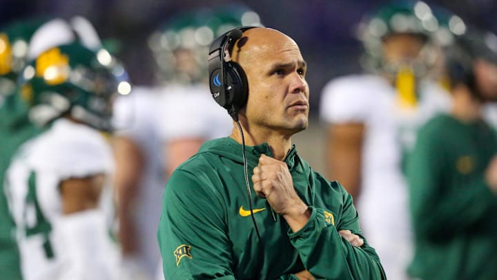 Nov 11, 2023; Manhattan, Kansas, USA; Baylor Bears head coach Dave Aranda looks on during the fourth quarter against the Kansas State Wildcats at Bill Snyder Family Football Stadium. Mandatory Credit: Scott Sewell-Imagn Images Nov 11, 2023; Manhattan, Kansas, USA; Baylor Bears head coach Dave Aranda looks on during the fourth quarter against the Kansas State Wildcats at Bill Snyder Family Football Stadium. Mandatory Credit: Scott Sewell-Imagn Images