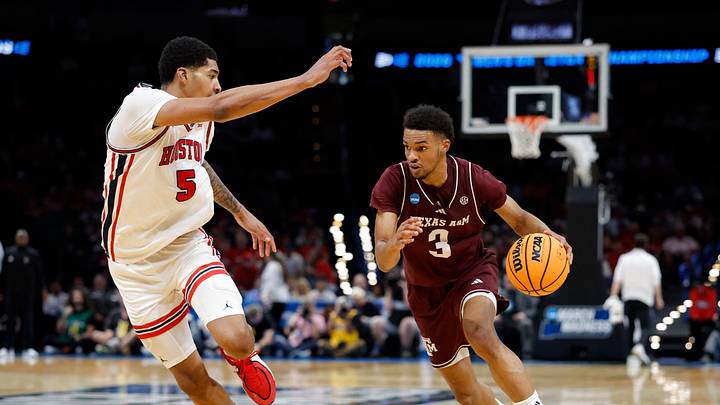 Mar 21, 2026; Oklahoma City, OK, USA; Texas A&M Aggies guard Rylan Griffen (3) drives to the hoop past Houston Cougars center Chris Cenac Jr. (5) during the first half of a second round game of the men's 2026 NCAA Tournament at Paycom Center. Mandatory Credit: Alonzo Adams-Imagn Images Mar 21, 2026; Oklahoma City, OK, USA; Texas A&M Aggies guard Rylan Griffen (3) drives to the hoop past Houston Cougars center Chris Cenac Jr. (5) during the first half of a second round game of the men's 2026 NCAA Tournament at Paycom Center. Mandatory Credit: Alonzo Adams-Imagn Images