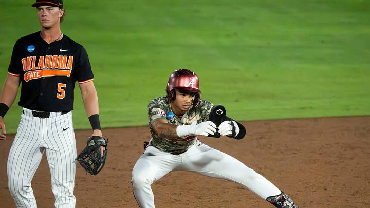 May 31, 2026; Tuscaloosa, AL, USA; Alabama batter Justin Lebron (1) celebrates a double during the Tuscaloosa NCAA Regional in the championship series between Oklahoma State and Alabama.