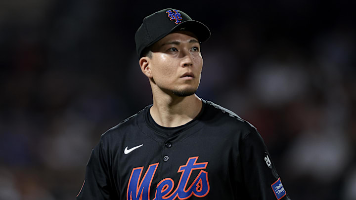 Jul 26, 2024; New York City, New York, USA; New York Mets starting pitcher Kodai Senga (34) looks back at the main scoreboard during the fourth inning against the Atlanta Braves at Citi Field. Mandatory Credit: Vincent Carchietta-USA TODAY Sports