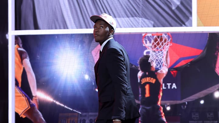 Jun 25, 2025; Brooklyn, NY, USA; Derik Queen reacts on stage after being selected as the 13th pick by the Atlanta Hawks in the first round of the 2025 NBA Draft at Barclays Center. Mandatory Credit: Brad Penner-Imagn Images Jun 25, 2025; Brooklyn, NY, USA; Derik Queen reacts on stage after being selected as the 13th pick by the Atlanta Hawks in the first round of the 2025 NBA Draft at Barclays Center. Mandatory Credit: Brad Penner-Imagn Images