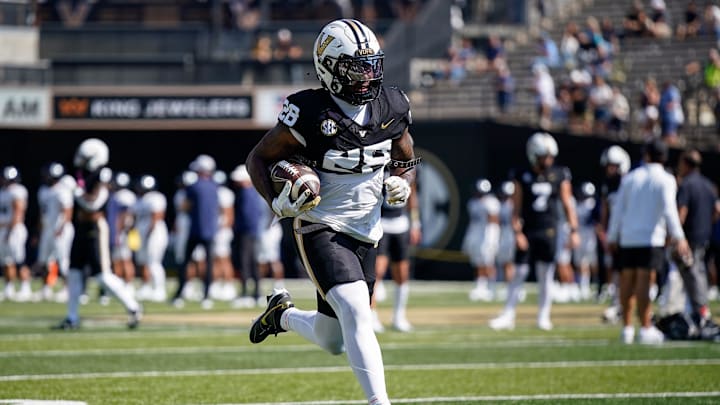 Vanderbilt running back Sedrick Alexander (28) warms up before a game against Utah State at FirstBank Stadium in Nashville, Tenn., Saturday, Sept. 27, 2025.