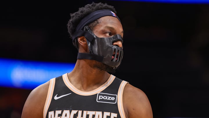 Feb 7, 2026; Atlanta, Georgia, USA; Atlanta Hawks forward Onyeka Okongwu (17) on the court with a facemask against the Charlotte Hornets in the second quarter at State Farm Arena. Mandatory Credit: Brett Davis-Imagn Images

