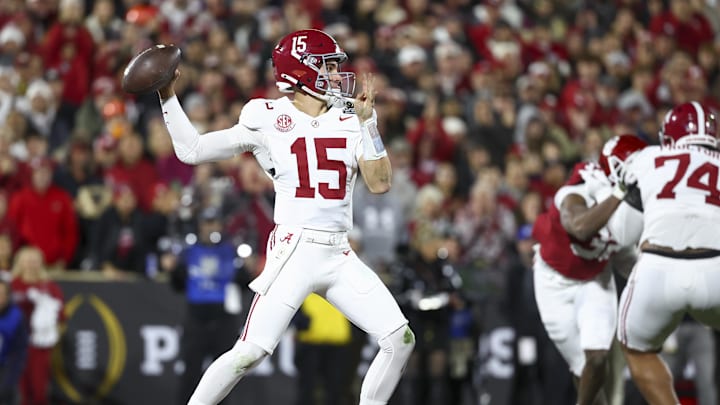 Dec 19, 2025; Norman, OK, USA; Alabama Crimson Tide quarterback Ty Simpson (15) looks to make a pass against the Oklahoma Sooners in the first half at Gaylord Family OK Memorial Stadium. Mandatory Credit: Mark J. Rebilas-Imagn Images