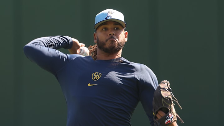 Sep 7, 2025; Pittsburgh, Pennsylvania, USA; Milwaukee Brewers pitcher Freddy Peralta (51) throws in the outfield before the game against the Pittsburgh Pirates at PNC Park. Mandatory Credit: Charles LeClaire-Imagn Images