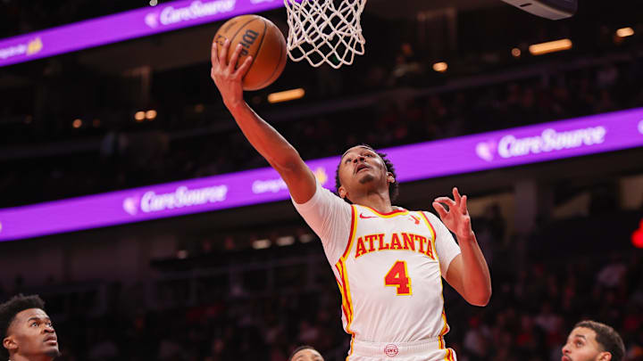 Dec 2, 2024; Atlanta, Georgia, USA; Atlanta Hawks guard Kobe Bufkin (4) shoots against the New Orleans Pelicans in the second quarter at State Farm Arena. Dec 2, 2024; Atlanta, Georgia, USA; Atlanta Hawks guard Kobe Bufkin (4) shoots against the New Orleans Pelicans in the second quarter at State Farm Arena.