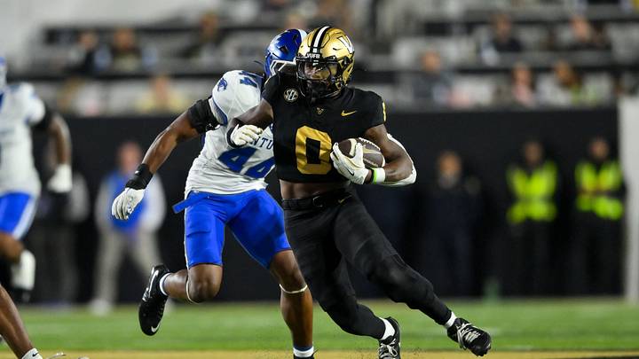 Nov 22, 2025; Nashville, Tennessee, USA; Vanderbilt Commodores wide receiver Junior Sherrill (0) cuts back after a made catch against the Kentucky Wildcats during the second half at FirstBank Stadium. Mandatory Credit: Steve Roberts-Imagn Images Nov 22, 2025; Nashville, Tennessee, USA; Vanderbilt Commodores wide receiver Junior Sherrill (0) cuts back after a made catch against the Kentucky Wildcats during the second half at FirstBank Stadium. Mandatory Credit: Steve Roberts-Imagn Images