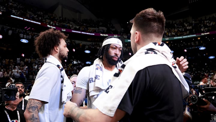 Apr 9, 2025; Dallas, Texas, USA;  Los Angeles Lakers guard Luka Doncic (77) hugs Dallas Mavericks forward Anthony Davis (3) after the game at American Airlines Center. Mandatory Credit: Kevin Jairaj-Imagn Images