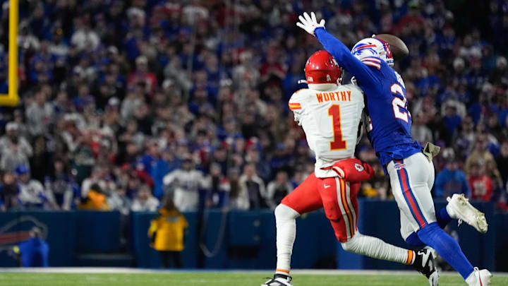 Nov 2, 2025; Orchard Park, New York, USA; Buffalo Bills safety Cole Bishop (24) breaks a pass intended for Kansas City Chiefs wide receiver Xavier Worthy (1) in the second quarter at Highmark Stadium. Mandatory Credit: Gregory Fisher-Imagn Images