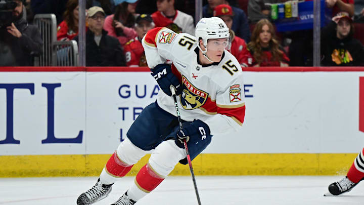 Nov 21, 2024; Chicago, Illinois, USA; Florida Panthers center Anton Lundell (15) skates with the puck against the Chicago Blackhawks during the second period at the United Center. Mandatory Credit: Daniel Bartel-Imagn Images