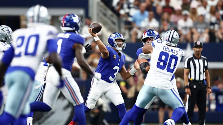 Sep 14, 2025; Arlington, Texas, USA; New York Giants quarterback Russell Wilson (3) passes the ball against the Dallas Cowboys during the first quarter at AT&T Stadium. Mandatory Credit: Kevin Jairaj-Imagn Images