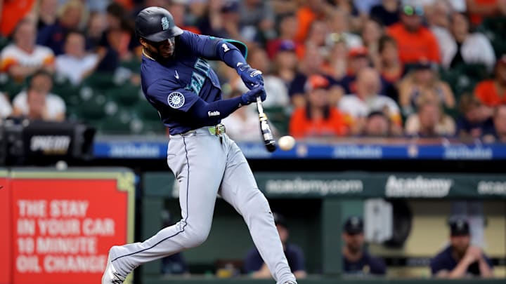Seattle Mariners right fielder Victor Robles (10) hits into a fielder's choice against the Houston Astros during the seventh inning at Minute Maid Park on Sept 25.