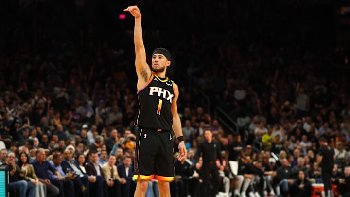 Dec 3, 2024; Phoenix, Arizona, USA; Phoenix Suns guard Devin Booker (1) against the San Antonio Spurs in the second half of an NBA Cup game at Footprint Center. Mandatory Credit: Mark J. Rebilas-Imagn Images
Dec 3, 2024; Phoenix, Arizona, USA; Phoenix Suns guard Devin Booker (1) against the San Antonio Spurs in the second half of an NBA Cup game at Footprint Center. Mandatory Credit: Mark J. Rebilas-Imagn Images