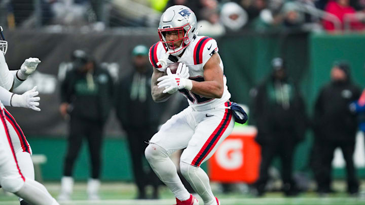 New England Patriots running back Treveyon Henderson (32) runs the ball during a game against the New York Jets at MetLife Stadium, Dec 28, 2025, East Rutherford, NJ, USA.