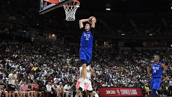 Jul 12, 2025; Las Vegas, NV, USA; Dallas Mavericks forward Cooper Flagg (32) dunks against the San Antonio Spurs in the fourth quarter of their game at Thomas & Mack Center. Mandatory Credit: Candice Ward-Imagn Images