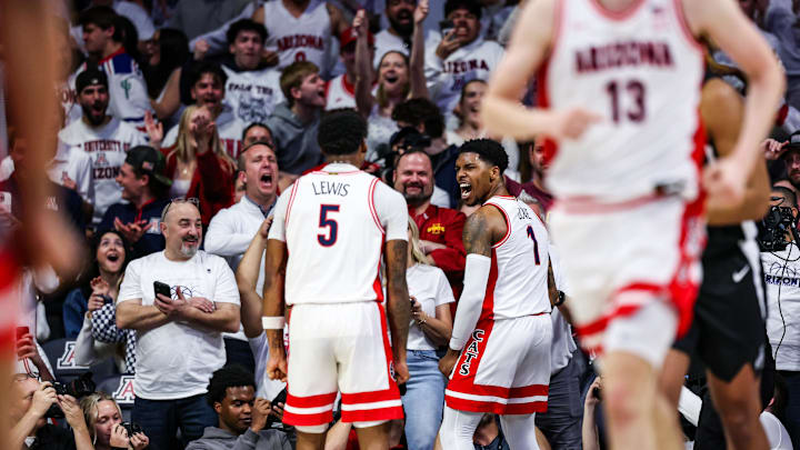 Jan 27, 2025; Tucson, Arizona, USA; Arizona Wildcats guard Caleb Love (1) celebrates a dunk he made during the first half against the Iowa State Cyclones at McKale Center. Mandatory Credit: Aryanna Frank-Imagn Images