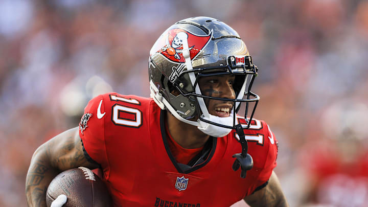 Aug 10, 2024; Cincinnati, Ohio, USA; Tampa Bay Buccaneers wide receiver Trey Palmer (10) runs with the ball against the Cincinnati Bengals in the first half at Paycor Stadium. Mandatory Credit: Katie Stratman-Imagn Images