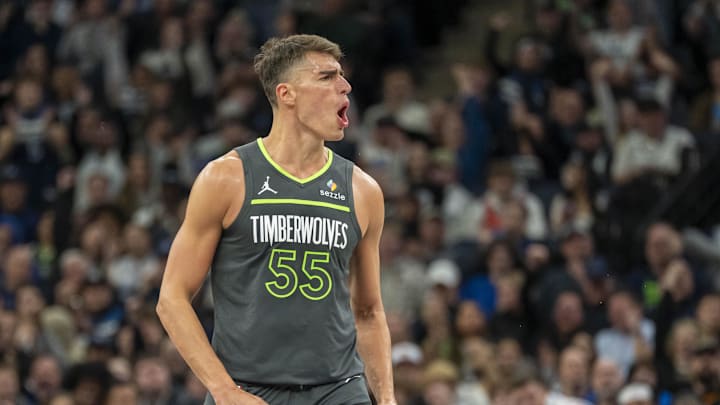 Feb 23, 2025; Minneapolis, Minnesota, USA; Minnesota Timberwolves center Luka Garza (55) reacts after making a three point shot against the Oklahoma City Thunder in the second half at Target Center. Mandatory Credit: Jesse Johnson-Imagn Images
