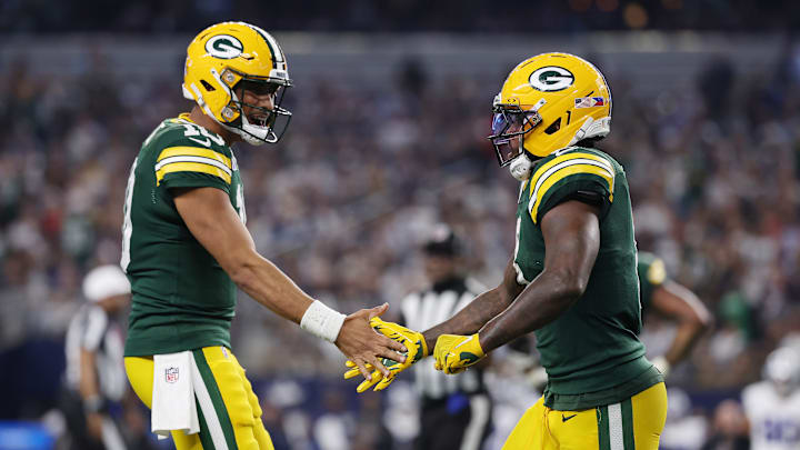 Green Bay Packers quarterback Jordan Love and running back Josh Jacobs