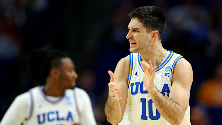 Mar 20, 2025; Lexington, KY, USA;  UCLA Bruins guard Lazar Stefanovic (10) celebrates after a play during the first half against the Utah State Aggies in the first round of the NCAA Tournament at Rupp Arena. Mandatory Credit: Jordan Prather-Imagn Images
