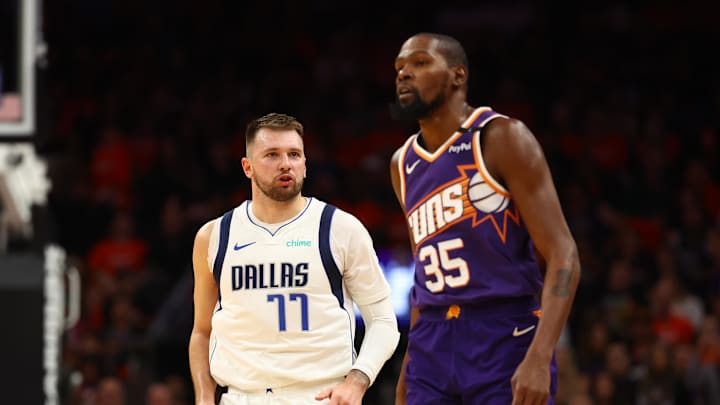 Oct 26, 2024; Phoenix, Arizona, USA; Dallas Mavericks guard Luka Doncic (77) against Phoenix Suns forward Kevin Durant (35) in the second half at Footprint Center. Mandatory Credit: Mark J. Rebilas-Imagn Images Oct 26, 2024; Phoenix, Arizona, USA; Dallas Mavericks guard Luka Doncic (77) against Phoenix Suns forward Kevin Durant (35) in the second half at Footprint Center. Mandatory Credit: Mark J. Rebilas-Imagn Images