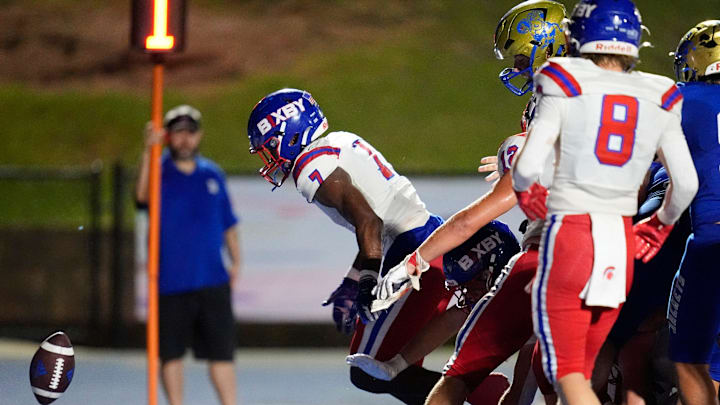 Bixby's Braeden Presley recovers a fumble before returning it for a touchdown during the high school football game between Choctaw and Bixby at Choctaw High School in Choctaw, Okla.. Friday, Sept., 20, 2024.