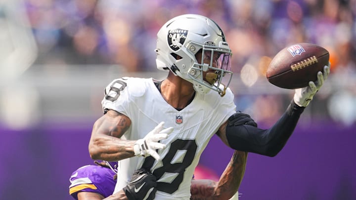 Aug 10, 2024; Minneapolis, Minnesota, USA; Las Vegas Raiders cornerback Jack Jones (18) interecpts a pass from Minnesota Vikings quarterback J.J. McCarthy (9) in the second quarter at U.S. Bank Stadium. Mandatory Credit: Brad Rempel-Imagn Images