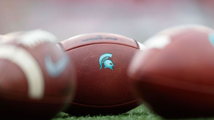 Oct 12, 2019; Madison, WI, USA; Michigan State Spartans logo on footballs during warmups prior to the game against the Wisconsin Badgers at Camp Randall Stadium. Mandatory Credit: Jeff Hanisch-USA TODAY Sports