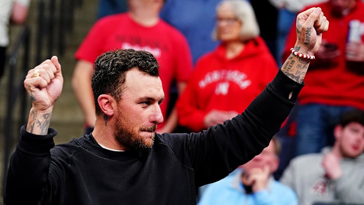 Mar 22, 2024; Memphis, TN, USA;  Texas A&M Aggies former quarterback Johnny Manziel watches the