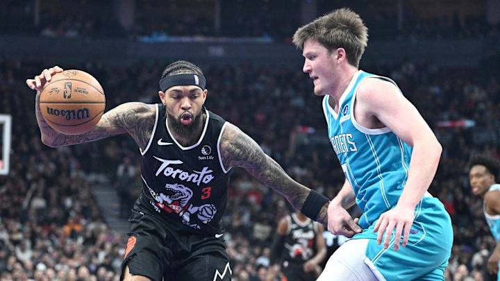 Nov 17, 2025; Toronto, Ontario, CAN; Toronto Raptors forward Brandon Ingram (3) dribbles the ball against Charlotte Hornets forward Kon Kneuppel (7) in the first half at Scotiabank Arena. Mandatory Credit: Dan Hamilton-Imagn Images Nov 17, 2025; Toronto, Ontario, CAN; Toronto Raptors forward Brandon Ingram (3) dribbles the ball against Charlotte Hornets forward Kon Kneuppel (7) in the first half at Scotiabank Arena. Mandatory Credit: Dan Hamilton-Imagn Images