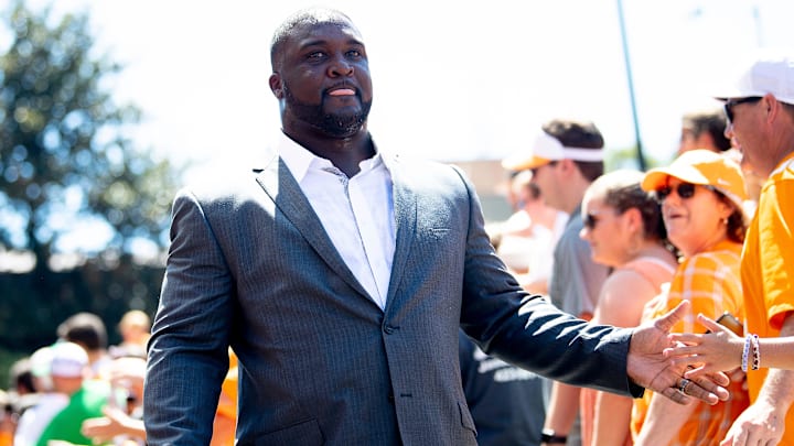 Tee Martin greets fans during the Vol Walk ahead of the Tennessee vs. Georgia football game at Neyland Stadium in Knoxville, Tennessee on Saturday, August 31, 2019.