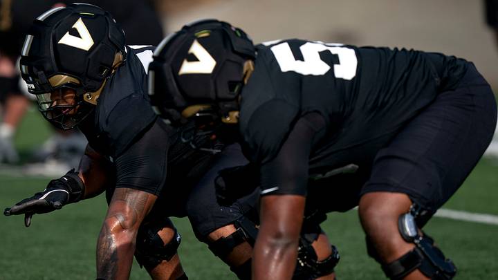 Vanderbilt offensive linemen Kevo Wesley (52) and Orion Irving (58) go through drills during practice at Vanderbilt University's McGugin Center practice fields Thursday, April 2, 2026. Vanderbilt offensive linemen Kevo Wesley (52) and Orion Irving (58) go through drills during practice at Vanderbilt University's McGugin Center practice fields Thursday, April 2, 2026.