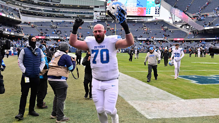 Dec 22, 2024; Chicago, Illinois, USA; Detroit Lions offensive tackle Dan Skipper (70) walks off the field after a game against the Chicago Bears at Soldier Field. Mandatory Credit: Daniel Bartel-Imagn Images