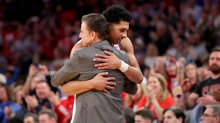 Mar 15, 2025; New York, NY, USA; St. John's Red Storm head coach Rick Pitino hugs guard RJ Luis Jr. (12) during the second half against the Creighton Bluejays at Madison Square Garden. Mandatory Credit: Brad Penner-Imagn Images