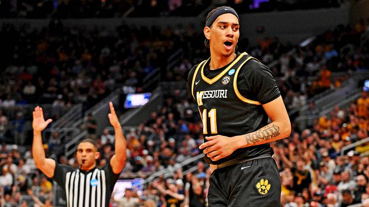 Mar 20, 2026; St. Louis, MO, USA; Missouri Tigers forward Trent Pierce (11) reacts after a play during the first half against the Miami (FL) Hurricanes during a first round game of the men's 2026 NCAA Tournament at Enterprise Center. Mandatory Credit: Jeff Curry-Imagn Images