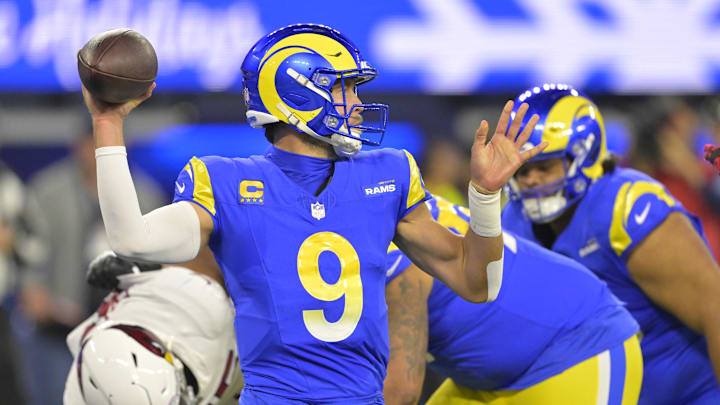 Dec 28, 2024; Inglewood, California, USA;   Los Angeles Rams quarterback Matthew Stafford (9) sets to pass in the first half against the Arizona Cardinals at SoFi Stadium. Mandatory Credit: Jayne Kamin-Oncea-Imagn Images