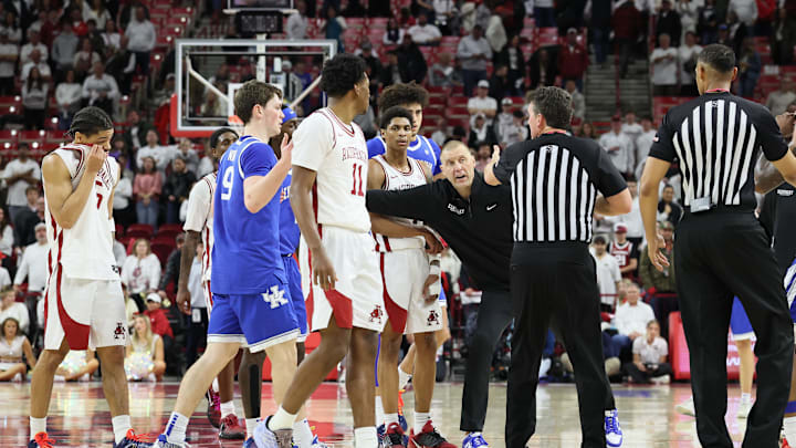 Jan 31, 2026; Fayetteville, Arkansas, USA; Kentucky Wildcats head coach Mark Pope separates players during the second half against the Arkansas Razorbacks at Bud Walton Arena. Kentucky won 85-77. Mandatory Credit: Nelson Chenault-Imagn Images Jan 31, 2026; Fayetteville, Arkansas, USA; Kentucky Wildcats head coach Mark Pope separates players during the second half against the Arkansas Razorbacks at Bud Walton Arena. Kentucky won 85-77. Mandatory Credit: Nelson Chenault-Imagn Images