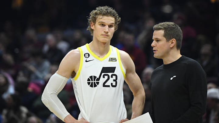 Dec 19, 2022; Cleveland, Ohio, USA; Utah Jazz forward Lauri Markkanen (23) talks to head coach Will Hardy in the second quarter against the Cleveland Cavaliers at Rocket Mortgage FieldHouse. Mandatory Credit: David Richard-Imagn Images