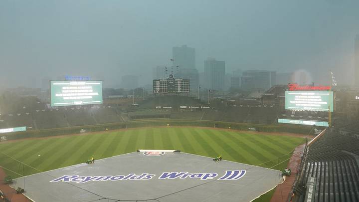Jul 3, 2026; Chicago, Illinois, USA; A general view of the field covered because of severe weather before a game between the Chicago Cubs and the St. Louis Cardinals at Wrigley Field. Mandatory Credit: David Banks-Imagn Images