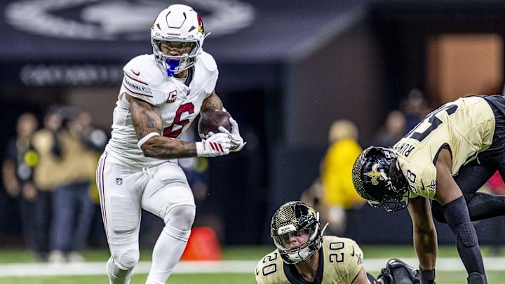 Sep 7, 2025; New Orleans, Louisiana, USA; Arizona Cardinals running back James Conner (6) dodges New Orleans Saints linebacker Pete Werner (20) during the first quarter at Caesars Superdome. Mandatory Credit: Stephen Lew-Imagn Images Sep 7, 2025; New Orleans, Louisiana, USA; Arizona Cardinals running back James Conner (6) dodges New Orleans Saints linebacker Pete Werner (20) during the first quarter at Caesars Superdome. Mandatory Credit: Stephen Lew-Imagn Images