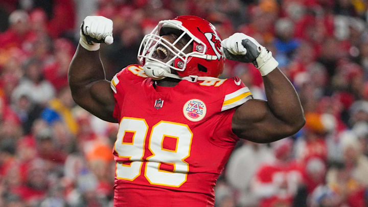 Dec 8, 2024; Kansas City, Missouri, USA; Kansas City Chiefs defensive tackle Tershawn Wharton (98) celebrates after a sack against the Los Angeles Chargers during the first half at GEHA Field at Arrowhead Stadium. Mandatory Credit: Denny Medley-Imagn Images