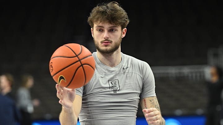 Dec 30, 2025; Omaha, Nebraska, USA; Creighton Bluejays forward Owen Freeman (32) warms up before the game against the Butler Bulldogs at CHI Health Center Omaha.