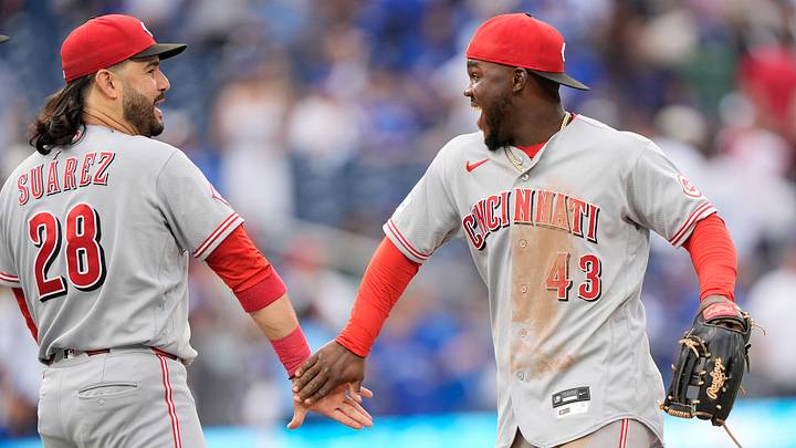 Sep 26, 2026; Toronto, Ontario, CAN; Cincinnati Reds designated hitter Eugenio Suarez (28) and right fielder Hector Rodriguez (43) celebrate after a win over the Toronto Blue Jays at Rogers Centre. Mandatory Credit: John E. Sokolowski-Imagn Images Sep 26, 2026; Toronto, Ontario, CAN; Cincinnati Reds designated hitter Eugenio Suarez (28) and right fielder Hector Rodriguez (43) celebrate after a win over the Toronto Blue Jays at Rogers Centre. Mandatory Credit: John E. Sokolowski-Imagn Images