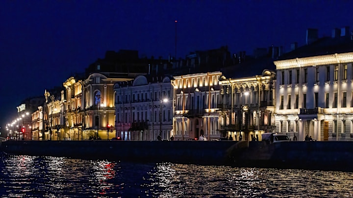 A view from the Neva River reveals the buildings along the...