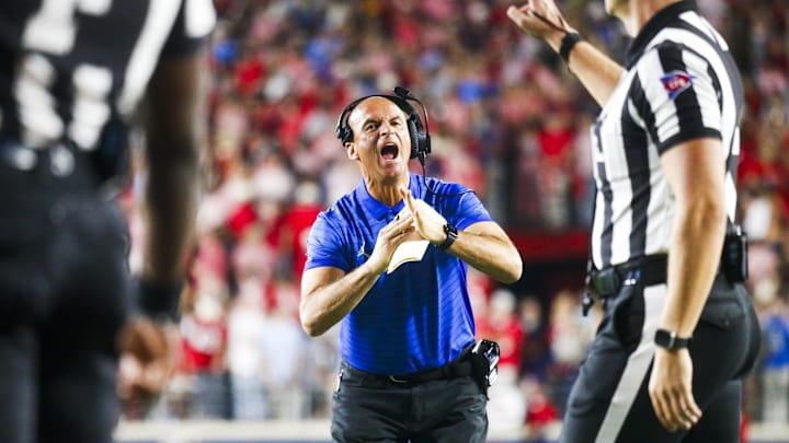 Nov 15, 2025; Oxford, Mississippi, USA; Florida Gators interim head coach Billy Gonzales calls for a timeout against the Mississippi Rebels during the second quarter at Vaught-Hemingway Stadium. Mandatory Credit: Petre Thomas-Imagn Images Nov 15, 2025; Oxford, Mississippi, USA; Florida Gators interim head coach Billy Gonzales calls for a timeout against the Mississippi Rebels during the second quarter at Vaught-Hemingway Stadium. Mandatory Credit: Petre Thomas-Imagn Images