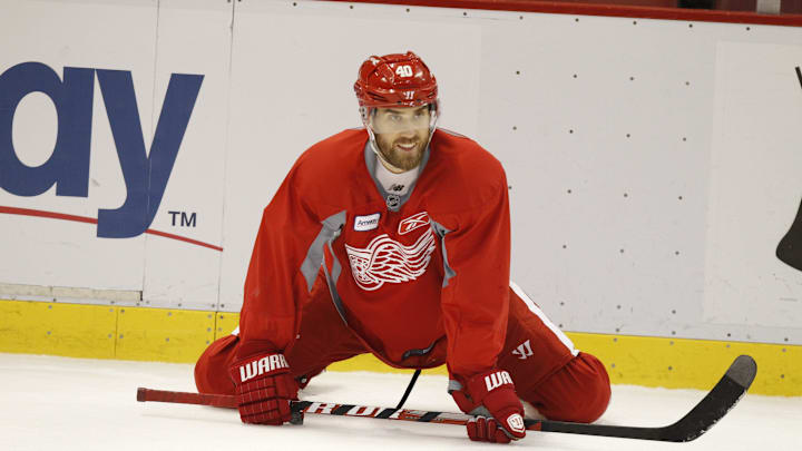 Red Wings forward Henrik Zetterberg stretches during a break in practice in Detroit on Monday, April 9, 2012.

Rw 040912 Prac Jhg29