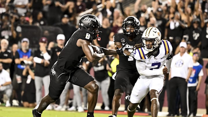 Oct 26, 2024; College Station, Texas, USA; Texas A&M Aggies running back Le'Veon Moss (8) runs the ball into the end zone for a touchdown during the first quarter against the LSU Tigers at Kyle Field. Mandatory Credit: Maria Lysaker-Imagn Images. Oct 26, 2024; College Station, Texas, USA; Texas A&M Aggies running back Le'Veon Moss (8) runs the ball into the end zone for a touchdown during the first quarter against the LSU Tigers at Kyle Field. Mandatory Credit: Maria Lysaker-Imagn Images.