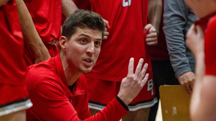 Head coach for Boulder Creek High School, Justin Collard, talks to his team during a timeout at Sandra day O'Connor high school gym in Phoenix on Jan. 26, 2024.