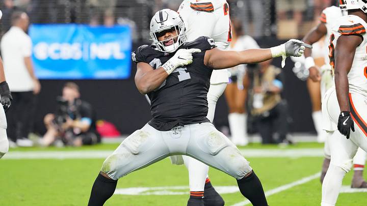 Sep 29, 2024; Paradise, Nevada, USA; Las Vegas Raiders defensive tackle Christian Wilkins (94) celebrates after a penalty overturned a scoring play by the Cleveland Browns during the fourth quarter at Allegiant Stadium. Mandatory Credit: Stephen R. Sylvanie-Imagn Images