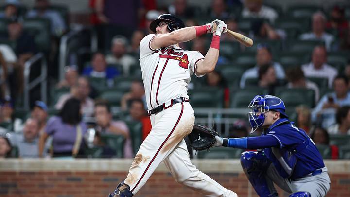 Aug 26, 2026; Cumberland, Georgia, USA;  Atlanta Braves catcher Sean Murphy (12) hits a solo home run against the Los Angeles Dodgers in the sixth inning at Truist Park.  Mandatory Credit: Colin Hubbard-Imagn Images